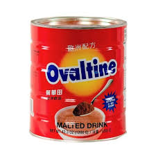 Ovaltine chocolate drink mix can on a white background