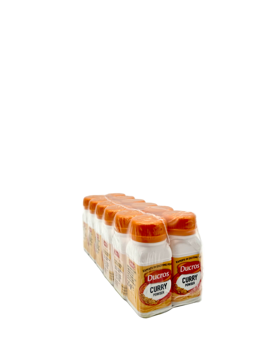 Row of Ducros Curry Spice bottles on a white background