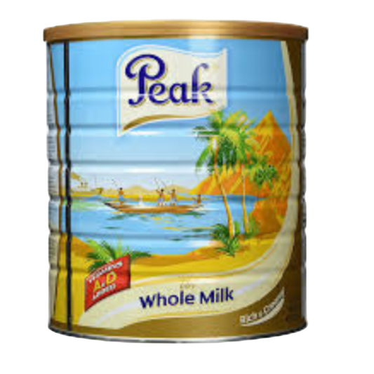 Peak whole milk can with a scenic label on a white background