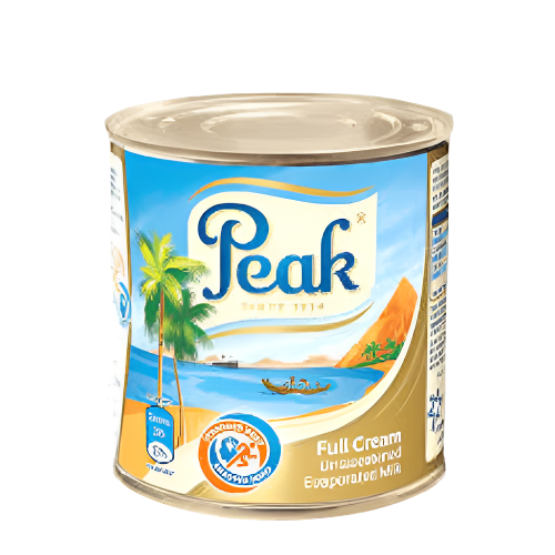 Peak full cream evaporated milk can with a scenic label