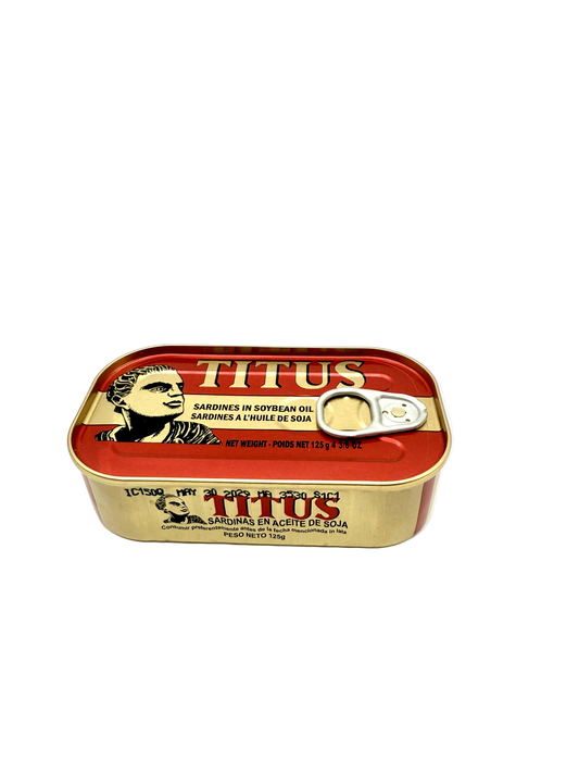 Red and gold can of Titus sardines on a white background